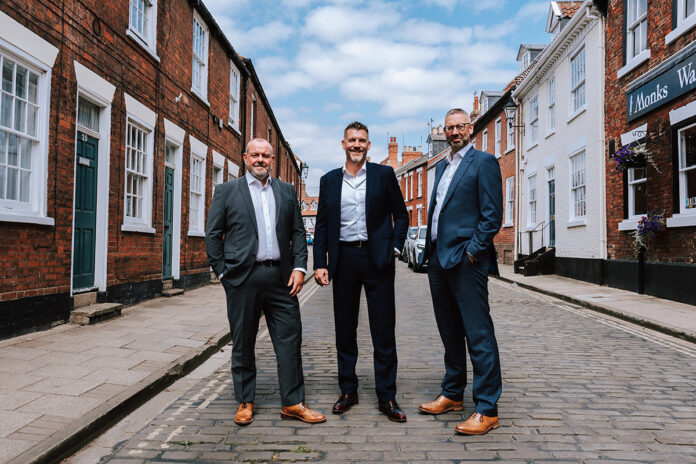 (LR) Darren Peacock, Allan Underwood and Gareth Fawke from Westwood Capital Finance